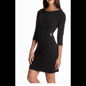 Beautiful black Laura Jefferies faux wrap dress with gold accent